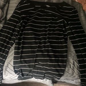 A black and white strip long sleeve shirt